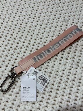 lululemon never lost keychain in pink mist/silver
